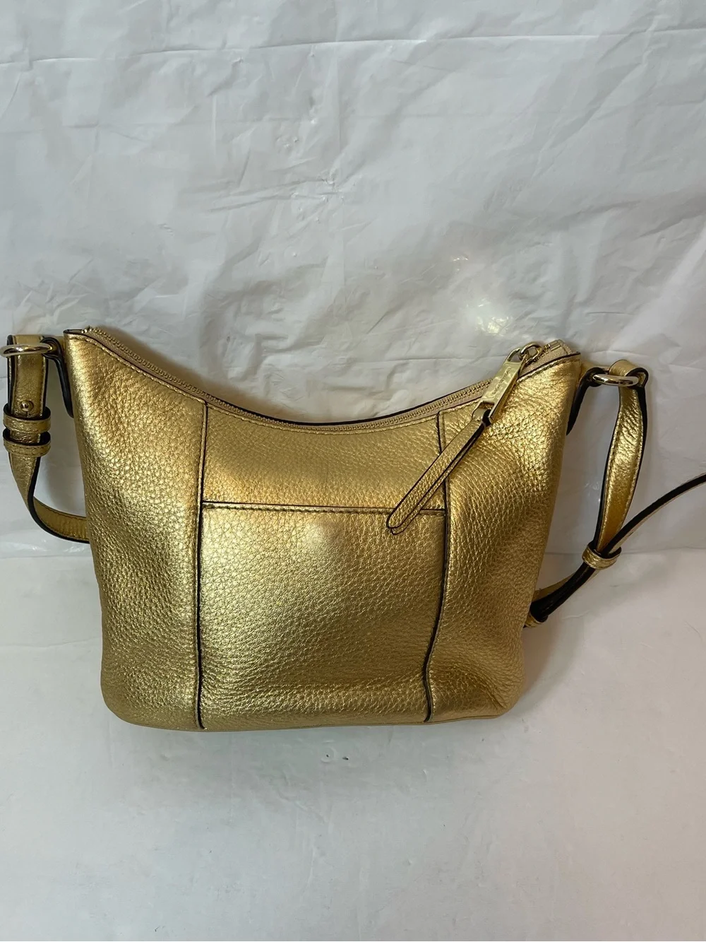 Michael Kors Gold leather hobo crossbody bag.